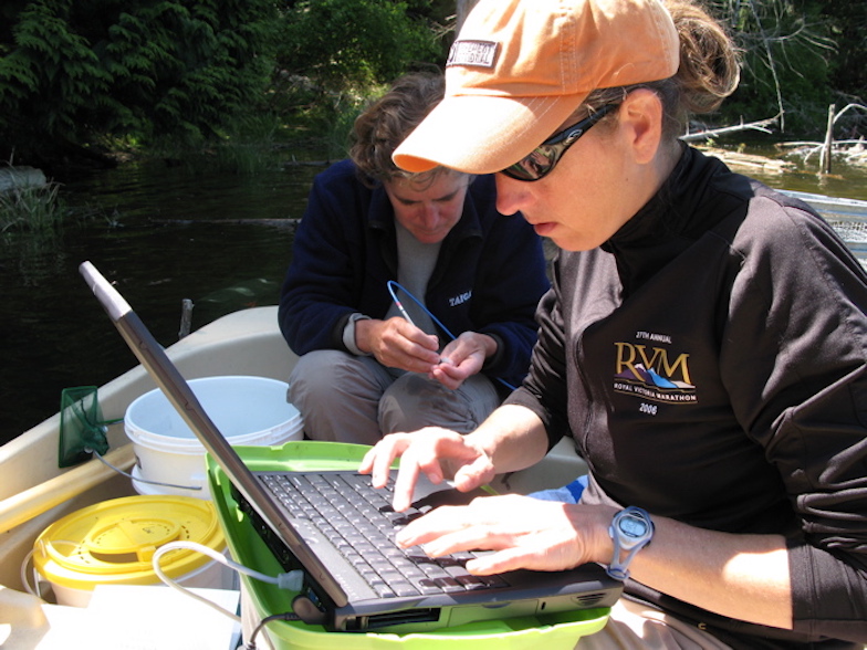 May 2007: Katie Peichel and Jenny Boughman collect male colour data on Enos Lake, British Columbia, Canada.